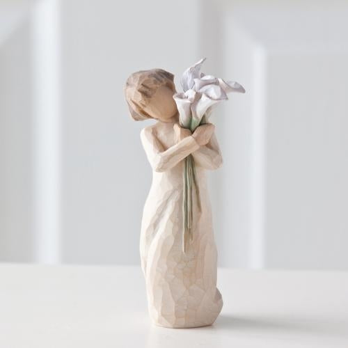 Beautiful Wishes figurine with flowers as a meaningful wishes gift